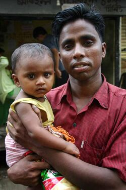 Father and child, Dhaka.jpg