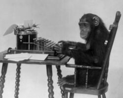 Chimpanzee seated at typewriter.jpg
