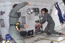 MIT students test the SPHERES satellites aboard NASA's reduced gravity aircraft.