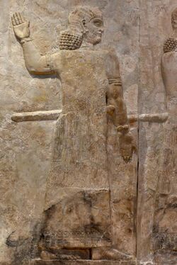 Assyrian master of ceremonies, part of a tributary scene. From Khorsabad, Iraq, c. 710 BCE.Iraq Museum.jpg
