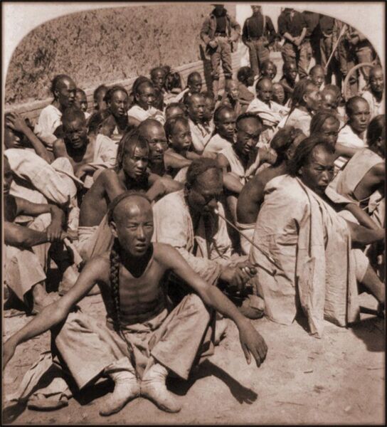File:Boxer Prisoners Captured By 6th US Cavalry, Tientsin, China (1901) Underwood & Co (RESTORED) (4072872709).jpg