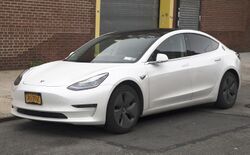 2020 Tesla Model 3 on taxi plates, Long Island City (front left).jpg