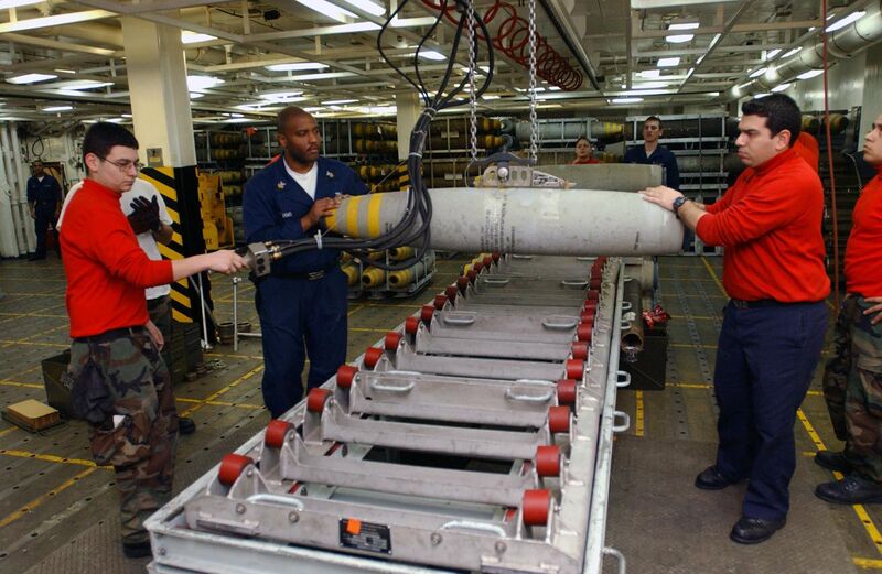 File:US Navy 030327-N-1328C-519 Aviation Ordnancemen assemble bombs aboard USS Theodore Roosevelt (CVN 71).jpg