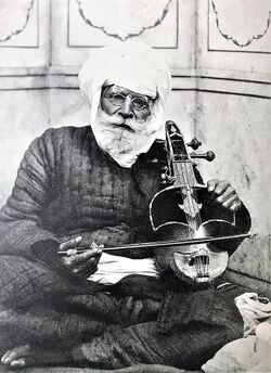 Photograph of Sant Shaam Singh Sewapanthi (celebrated Sikh saranda player), ca.1920.jpg