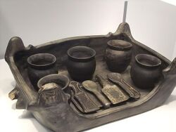 Foculum (Serving Tray) with Jars and Implements Etruscan from Chiusi A Tomb Group 550-500 BCE Earthen Bucchero ware.jpg