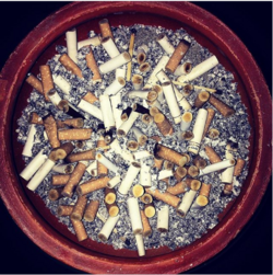 Ashtray full of Cigarette butts