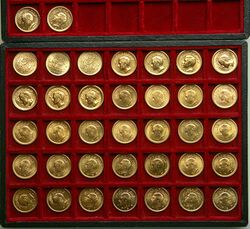 Collection of one pahlavi gold coins.jpg