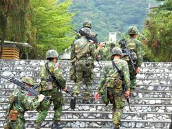 ROCA Soldiers Climbing Stair Go to Camp 20120324.jpg