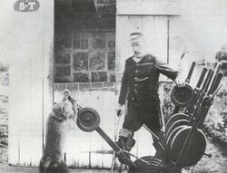 Disabled Signalman with his trained Baboon assistant - Uitenhage railway - Cape Colony 1884.jpg