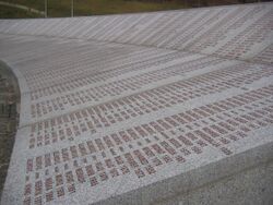 Srebrenica massacre memorial wall of names 2009 2.jpg