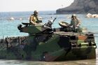 US Navy 040223-M-4806Y-036 Amphibious Assault Vehicles (AAV) arrive on the Philippine shore from the amphibious transport dock ship USS Fort McHenry (LSD 43).jpg