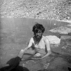 Crowley bathing in a spring during the K2 Expedition