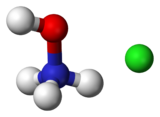 Ball-and-stick model of a hydroxylammonium cation (left) and a chloride anion (right)