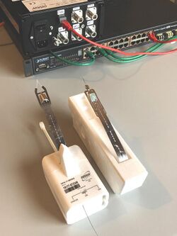 Two modern Graw radiosondes with desktop SDR receiver.jpg