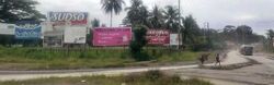 Welcome signs at Bugandi on the approach from Nadzab airport.jpg
