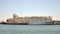 A livestock carrier receiving bunkers from a bunker vessel in Fremantle Harbour, Australia
