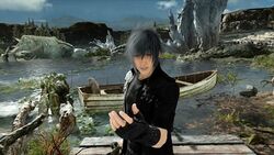 A first person view of a large open lake with boats in the background and Noctis smiling in the foreground standing directly in front of the player and making an open friendly gesture with his left hand.