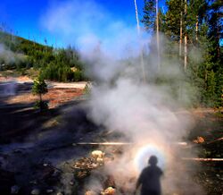 Solar glory at the steam from hot spring.jpg
