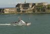 US Coast Guard Cutter Chincoteague (WPB-1320) passes Fort San Felipe del Morro.jpg