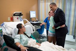 Barack Obama visiting victims of 2012 Aurora shooting.jpg