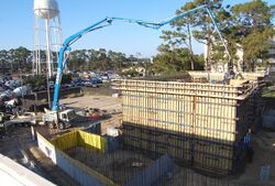Construction site with concrete pump truck.JPG