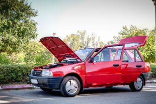 Dacia Nova GT - Front-Left with opened doors.jpg