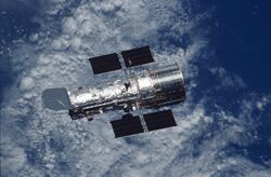 Hubble Space Telescope over Earth (during the STS-109 mission).jpg