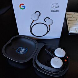 Pixel Buds in charging case with product box.jpg