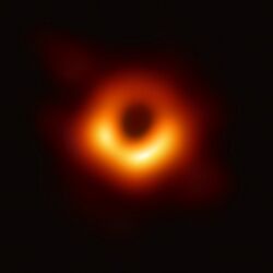 A blurry photo of a supermassive black hole in M87.