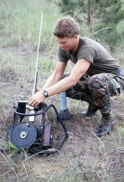 Sergeant (SGT) Tony Ramsay, 56th Combat Support Squadron, sets up a GTR-18A Smokey Sam surface-to-air missile simulator during Exercise PATRIOT PEACH '86 - DPLA - bbbd13e7682041f10963f0707063c367.jpeg
