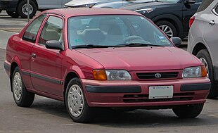 1997 Toyota Tercel 2-Door CE in Coral Rose Pearl, Front Right, 05-18-2023.jpg