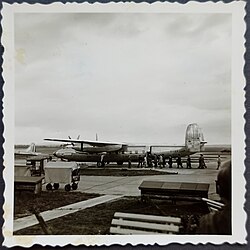 Passengers board a British European Airways G-AMAH Airspeed Ambassador aircraft in 1954.