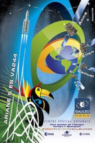 The Ariane 5 launch vehicle, four Galileo satellites, and a toucan, depicted in front of the Earth surrounded by rings in the colors of the Brazilian flag
