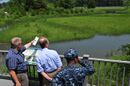 US Navy 100615-N-1688B-034 Don Shregardus is briefed on Environmental Restoration Site 8, Watchable Wildlife Area, at Joint Expeditionary Base Little Creek-Fort Story.jpg