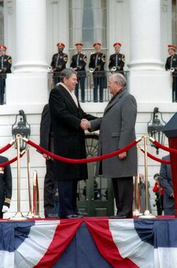 President Ronald Reagan and Soviet General Secretary Mikhail Gorbachev shaking hands at the arrival ceremony on the White House south lawn.jpg