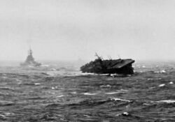 USS Langley (CVL-27) and battleship in typhoon 1944.jpeg