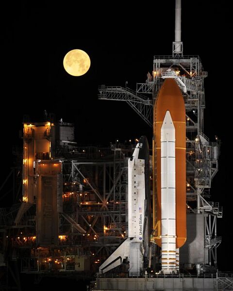 File:Space Shuttle Discovery under a full moon, 03-11-09.jpg