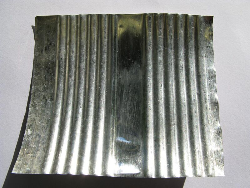 File:Inside of a tin platted can.jpg
