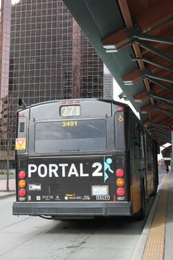Portal 2 ad on a King County Metro bus in Bellevue, WA.jpg