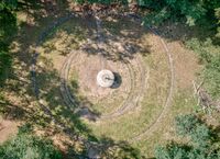 The monument's cement circles and cement flying saucer landing gear impressions are visible in a recent drone photograph.