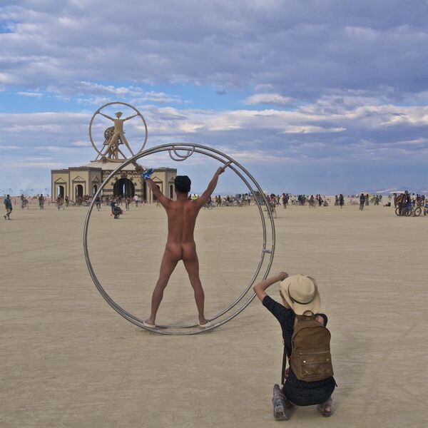 File:Posing nude at Burning Man.jpg
