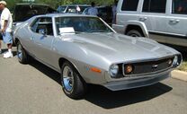 Shows a 1971 Javelin AMX that became the top performance model