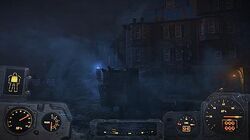 A screenshot of the gameplay in Fallout 4, with the player in a foggy environment with the Power Armor HUD.