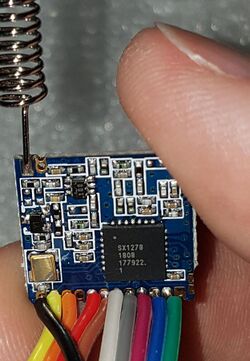 LoRa Module with antenna and SPI wires attached.jpg
