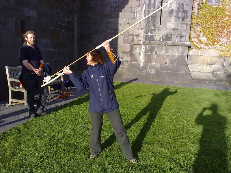 File:Poised to launch a dart from an atlatl.jpg