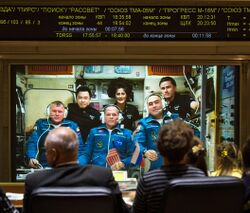 Soyuz TMA-06M crew talks with the Russian Mission Control.jpg