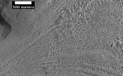 Surface around mound in Deuteronilus Mensae.JPG