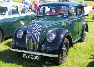 Morris eight with Beetlelike headlight covers as fitted to the 1938 version.jpg