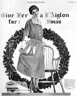 Illustration of a woman in a gingham dress standing in front of a large Christmas wreath