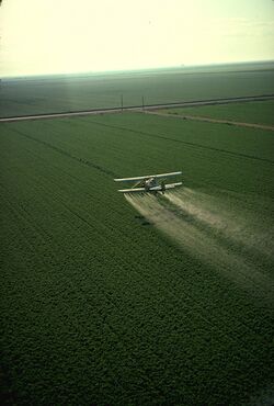 Cropduster spraying pesticides.